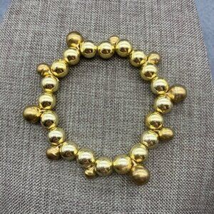 Christmas Jingle Bell Bracelet Shiny Gold Stretch Beaded Festive Fun Bumpy Retro